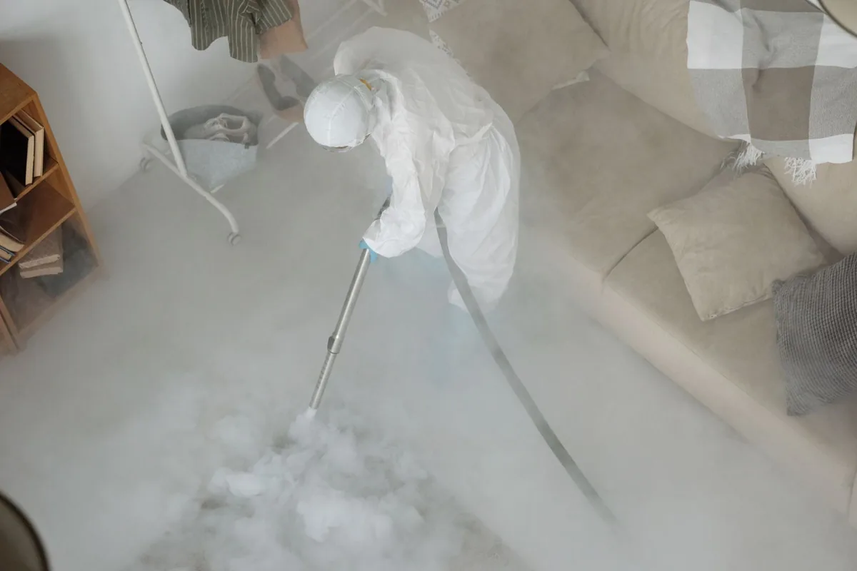 Biohazard cleanup technician in protective equipment, Frewsburg, NY